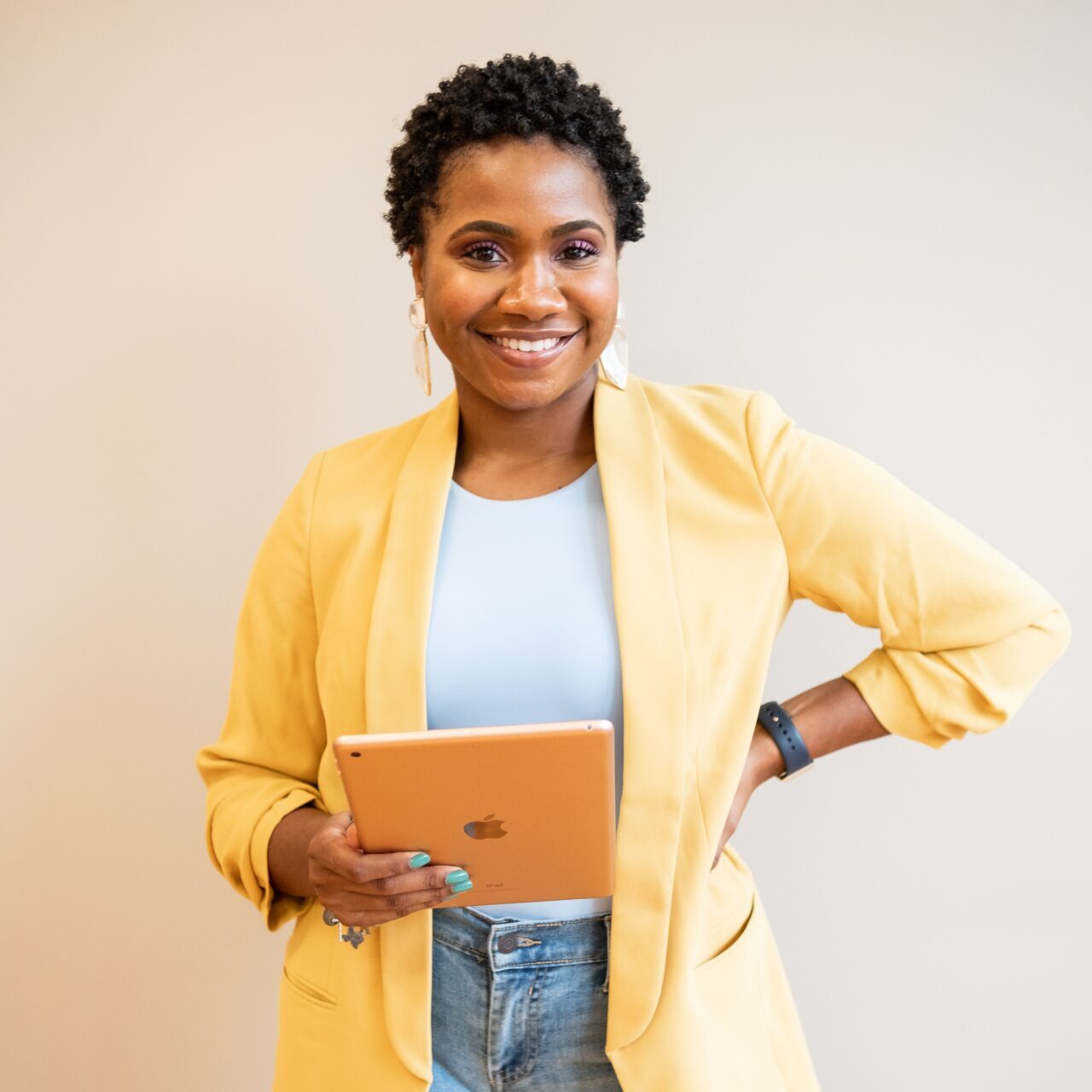 woman standing with ipad