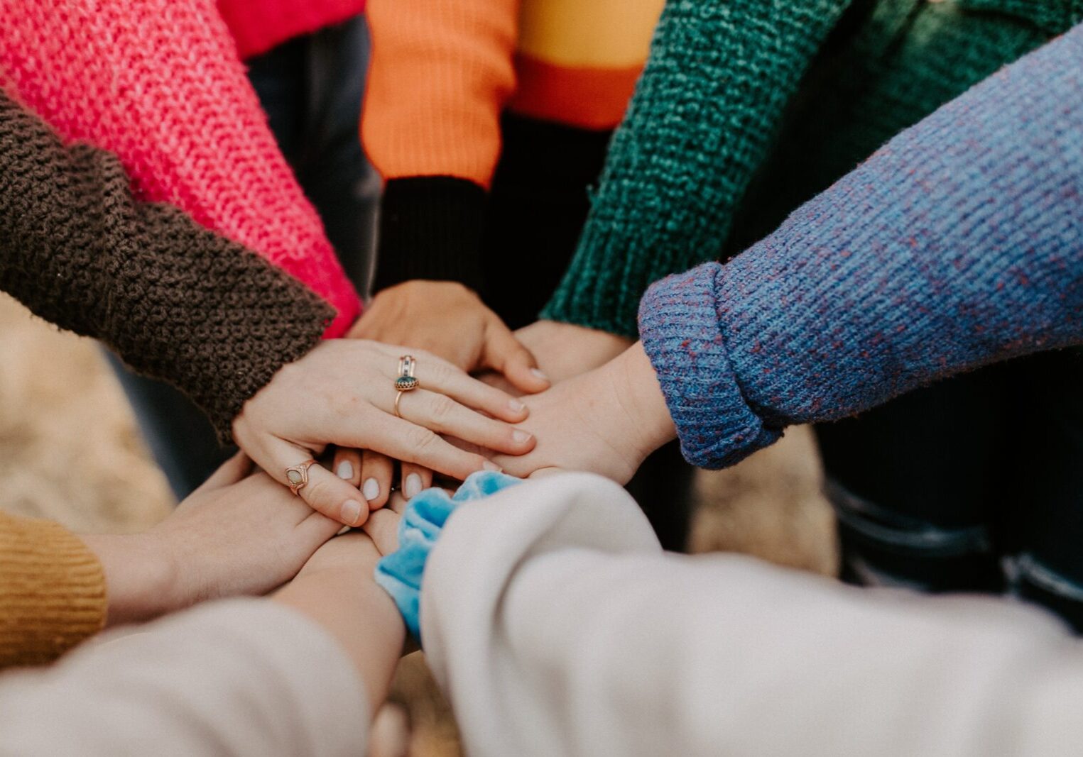 Multiple hands connected to show unity